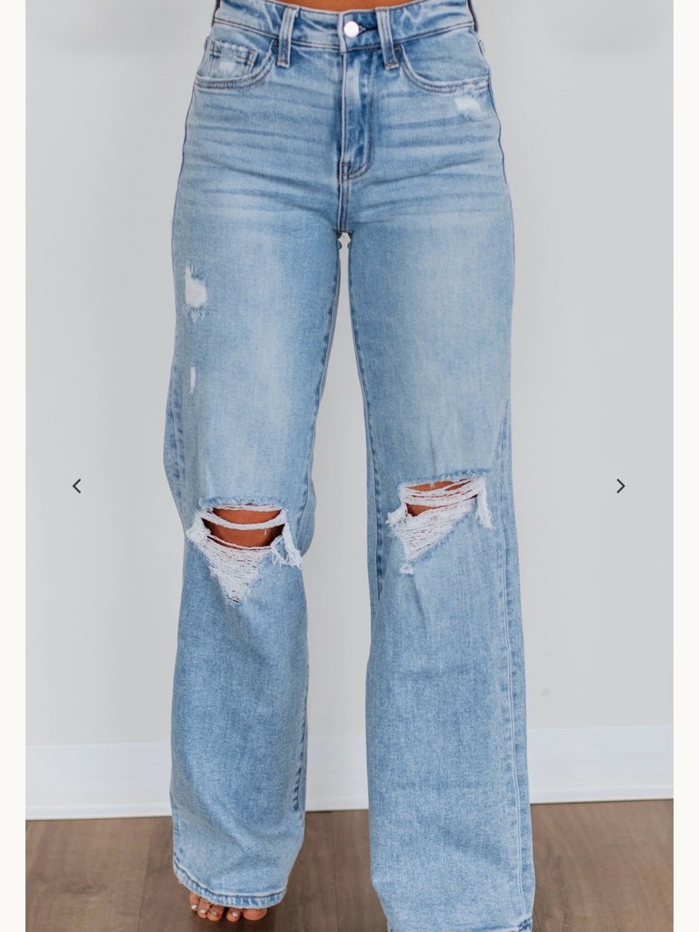 High-Rise Light Blue Wide-Leg Distressed Jeans